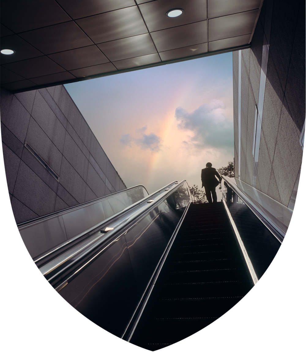 Man riding an escalator