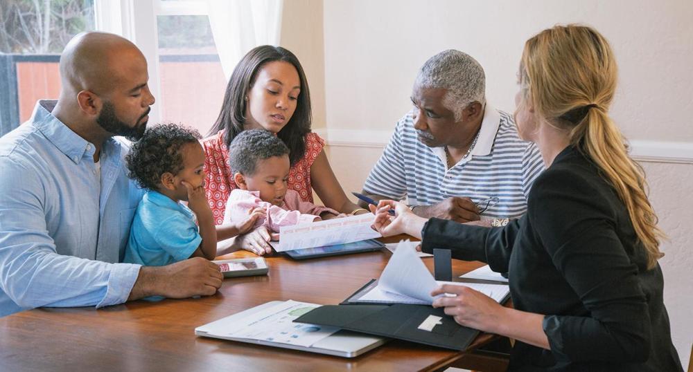 Generational black family meeting with financial advisor