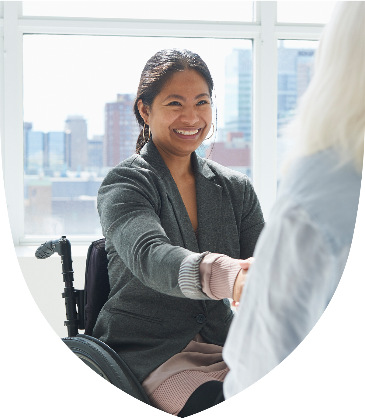 Special needs professional woman shaking hands with colleague