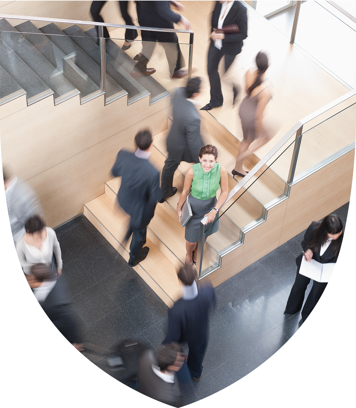 A woman looking up for a set of stairs