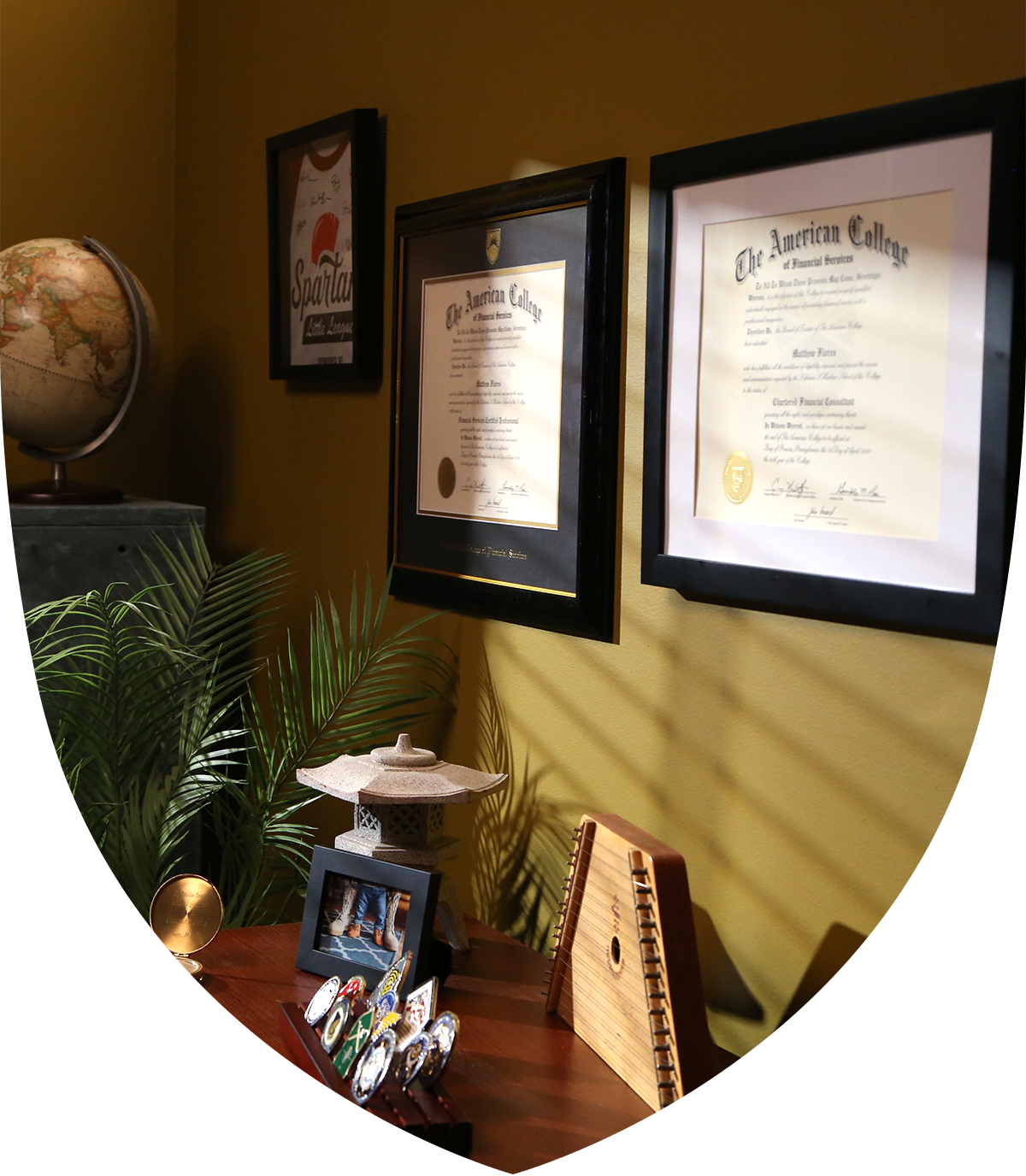 Diplomas and Degrees hanging on office wall