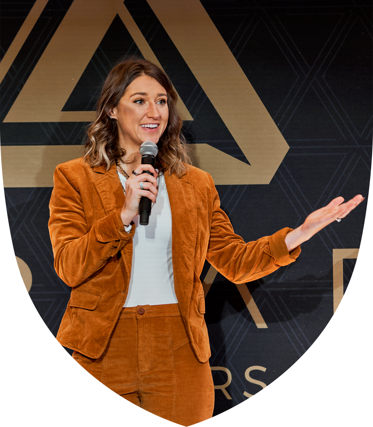 Image of a woman speaking to a crowd