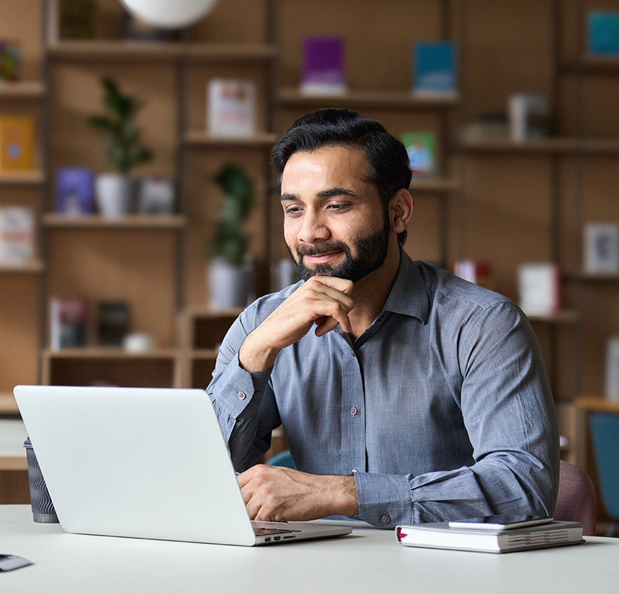 Man sitting at a laptop