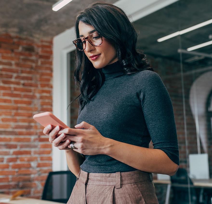 Image of a woman looking at her phone