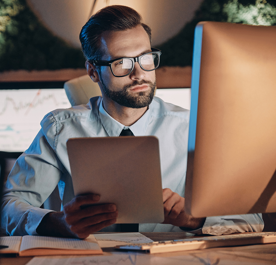 Man working at a desktop computer