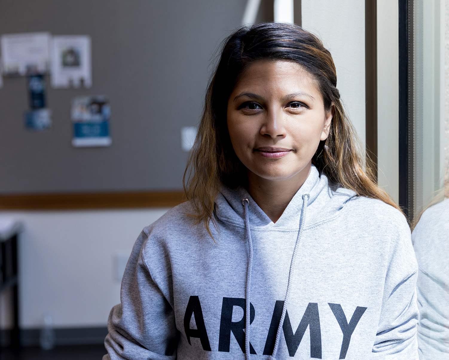 Close up of woman in an army sweatshirt