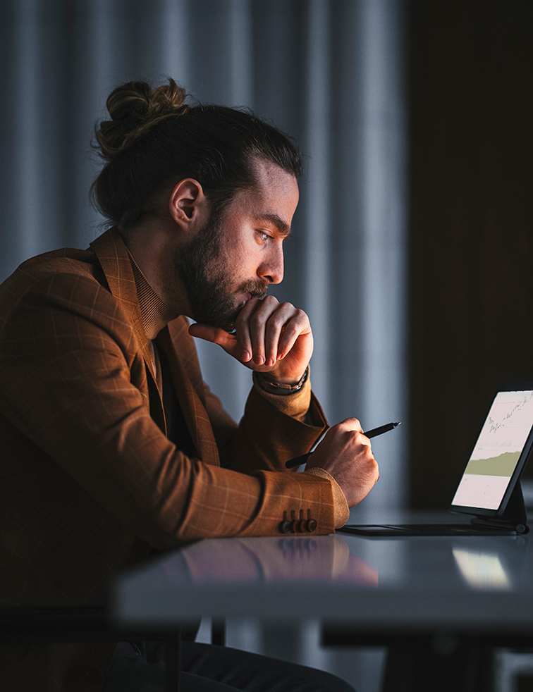Man looking at a laptop