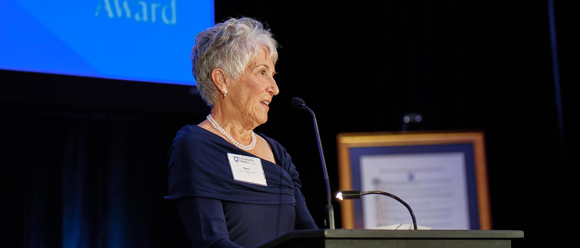 Mary Wright speaking at award ceremony