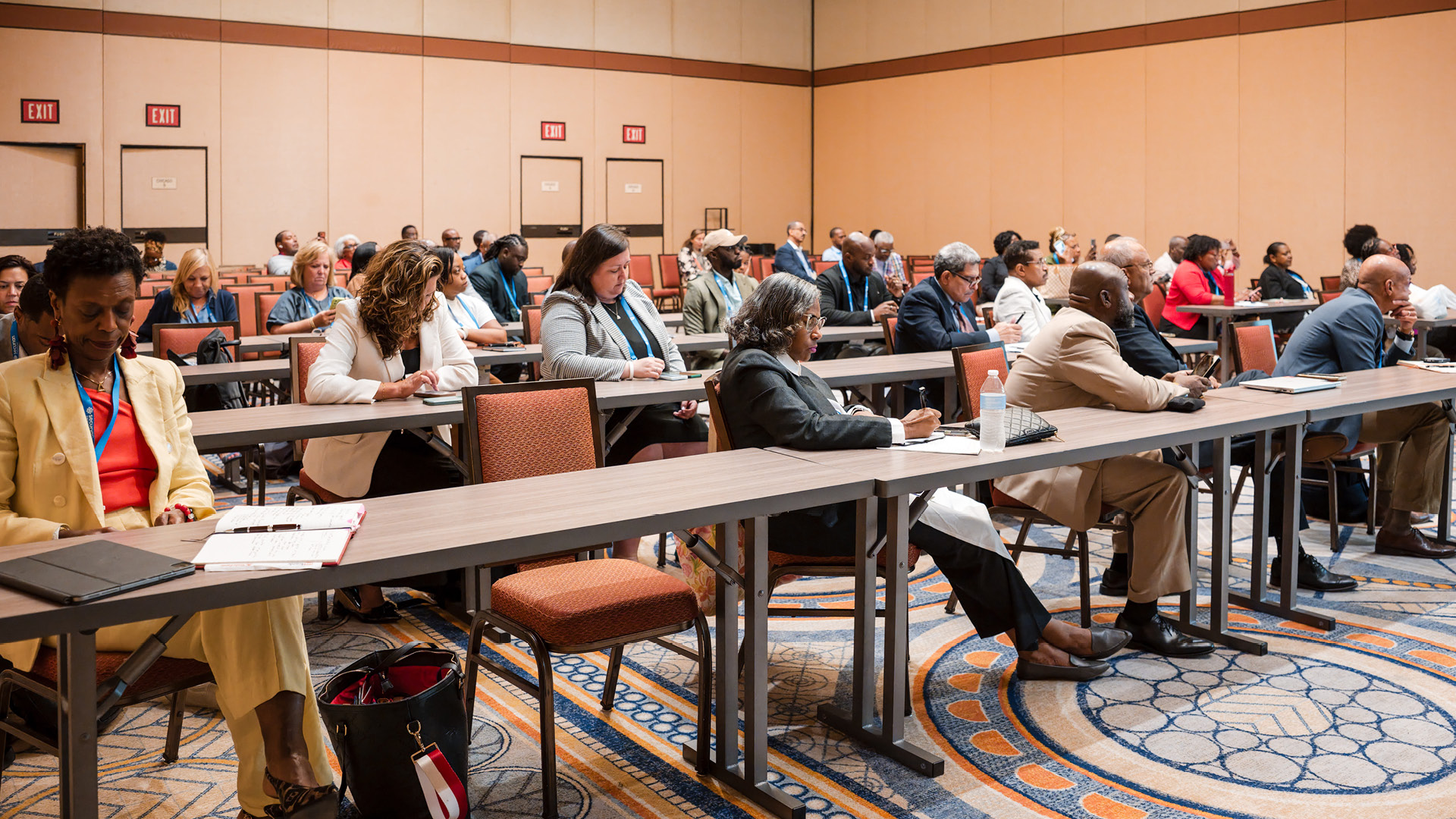 Attendees sitting in a conference hall