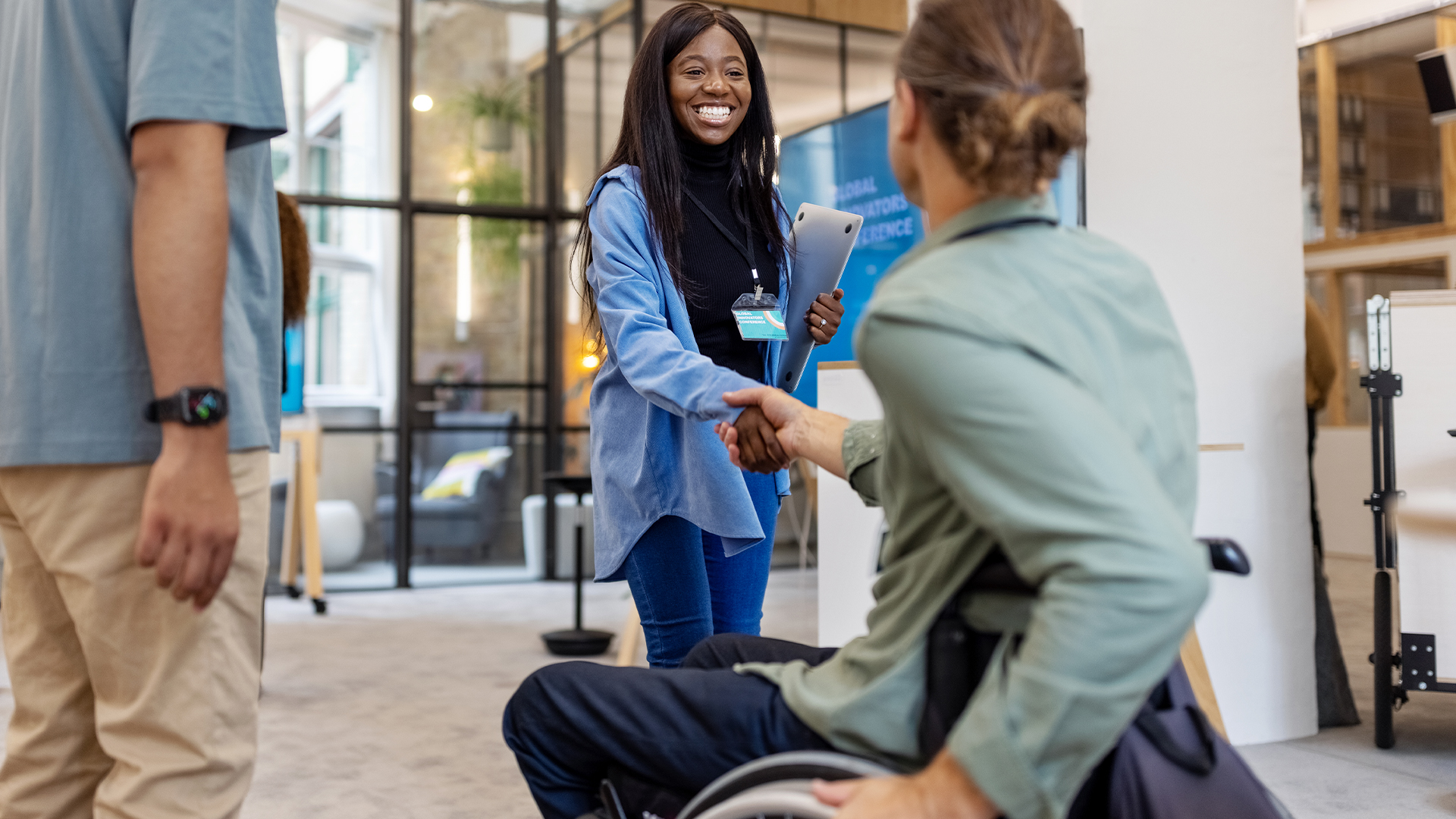 Female disability advocate helping a patient