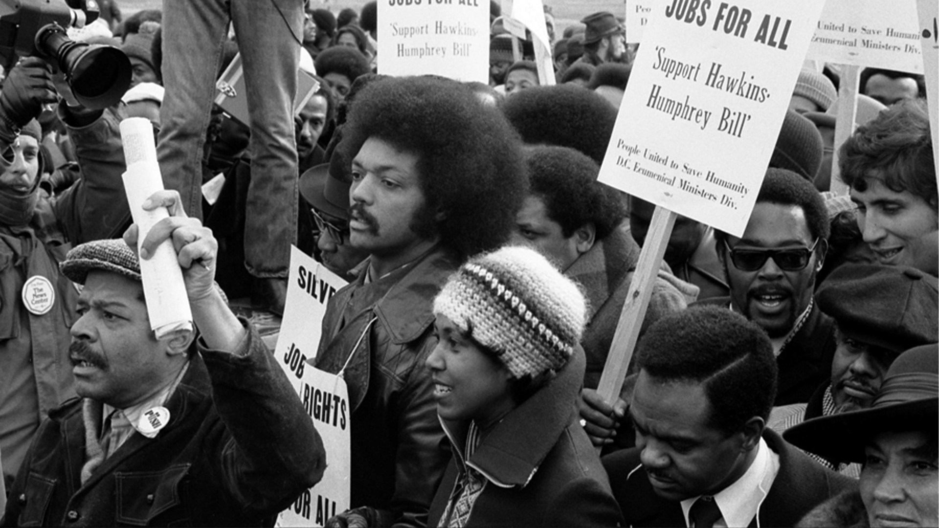 Photo of Jesse Jackson protesting in a crowd