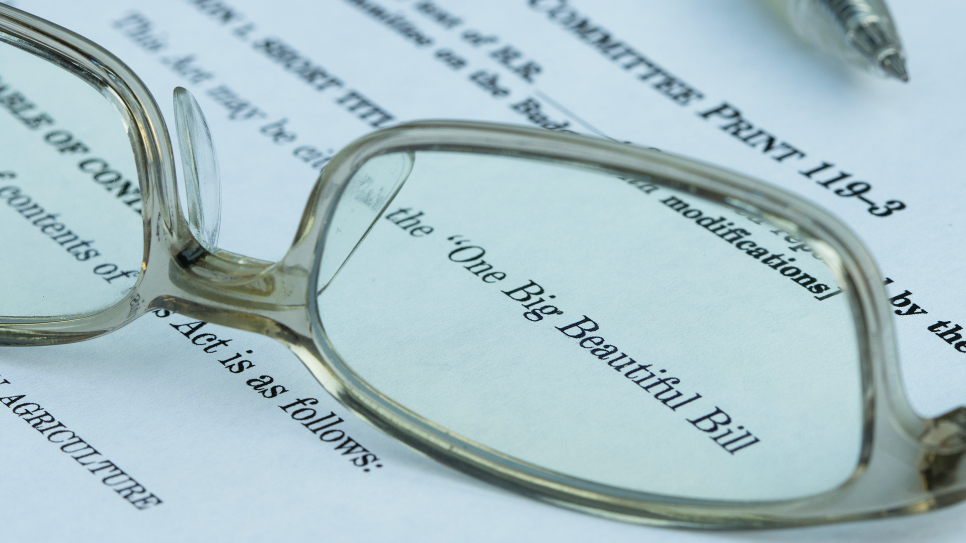 Eye glasses laying on top of an open letter
