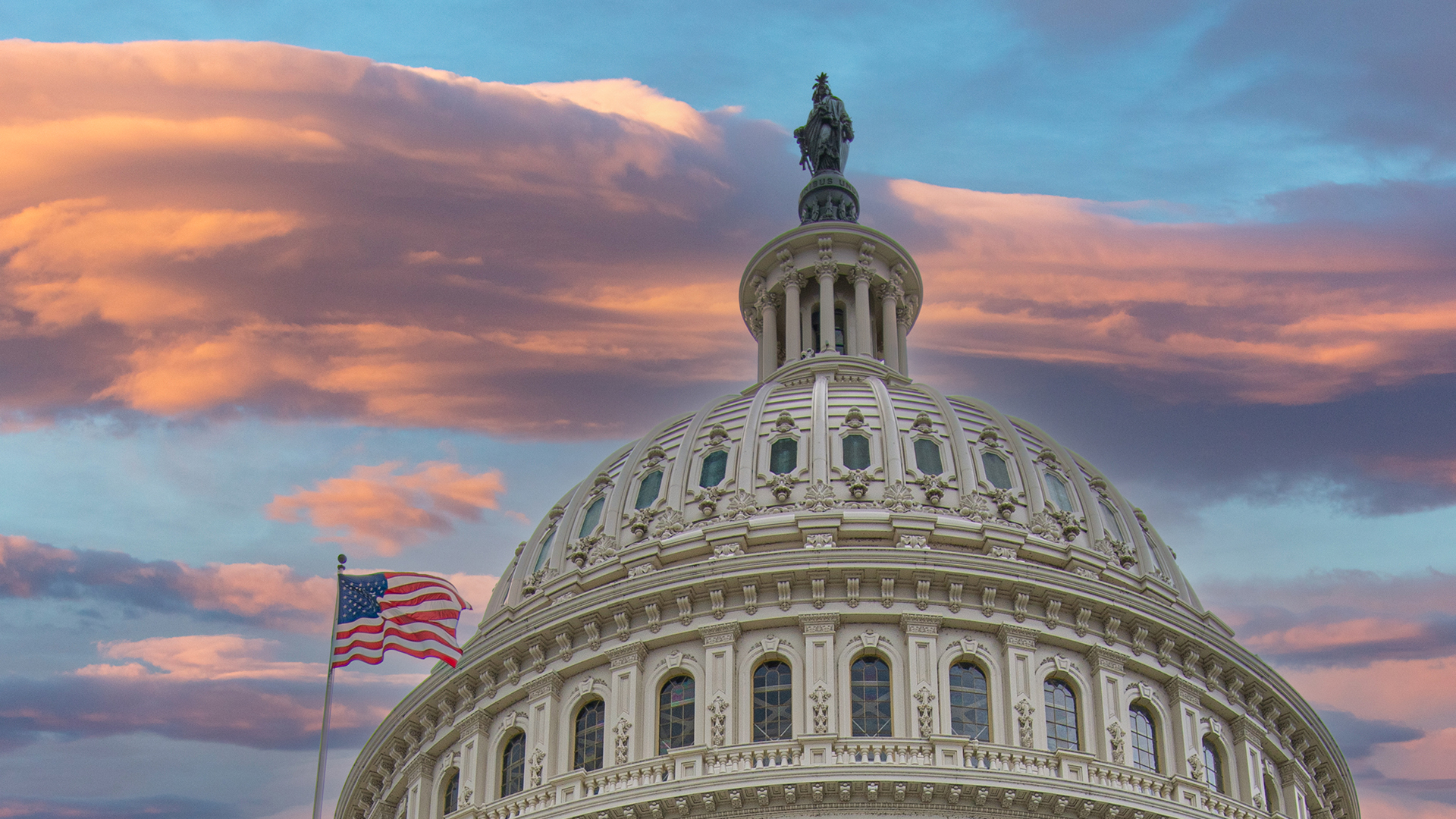 The US Capitol building at sunset