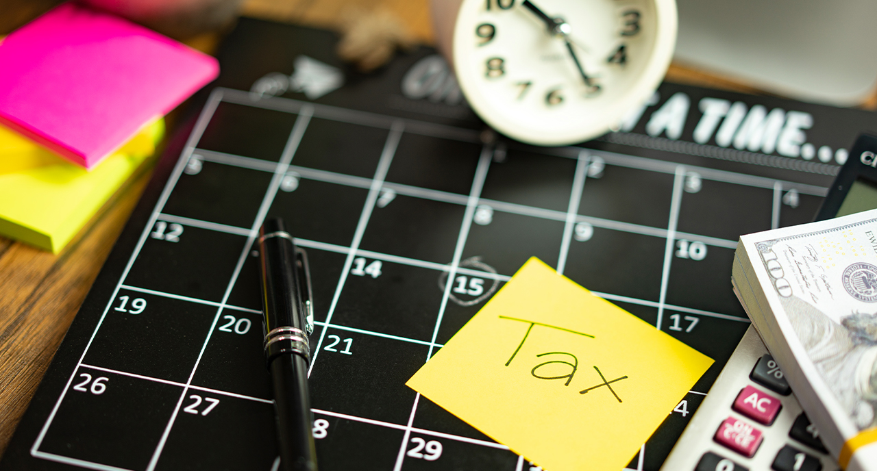 Calendar with clock, money, and posted note