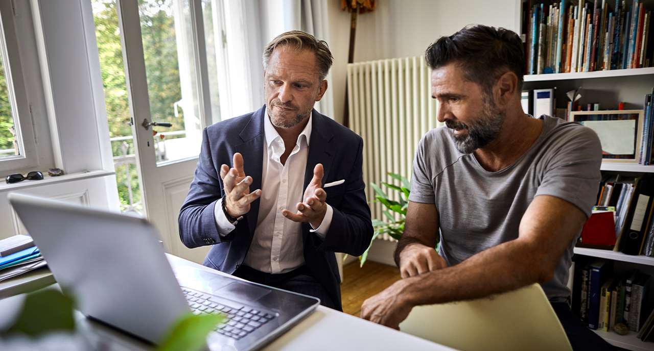 Financial advisor working with his client