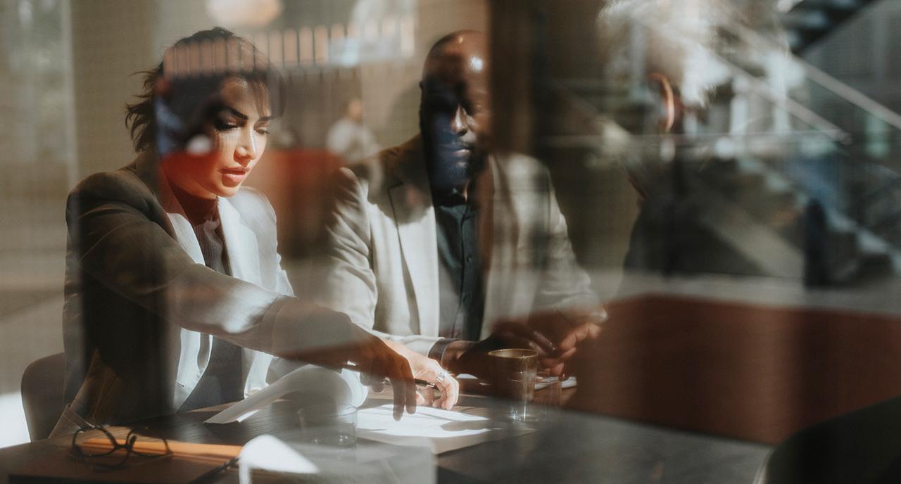 Financial advisor speaking with her client