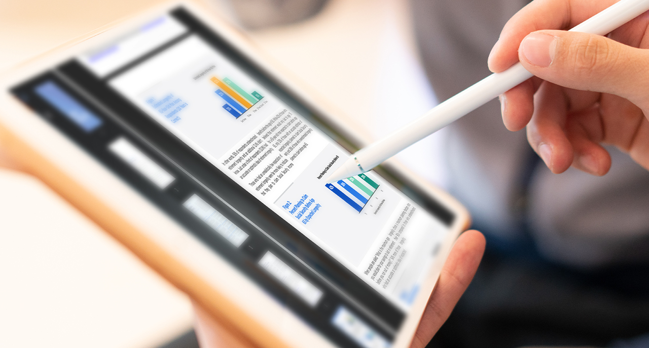 Man writing on his tablet with a stylus