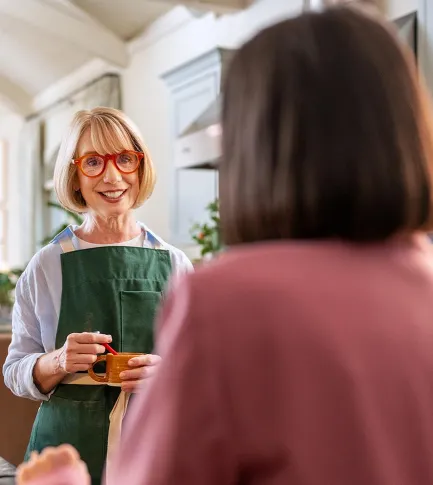 Retired women cooking in the kitchen