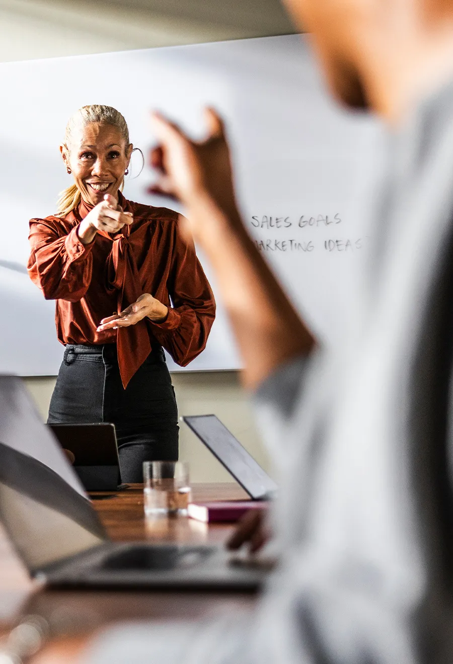 Instructor calling on man with a question