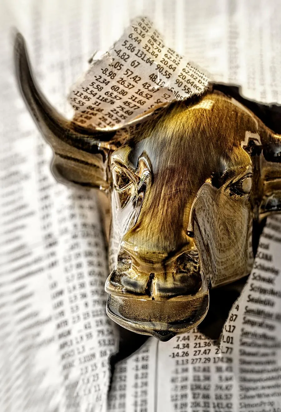 Golden bull ripping through stock sheet