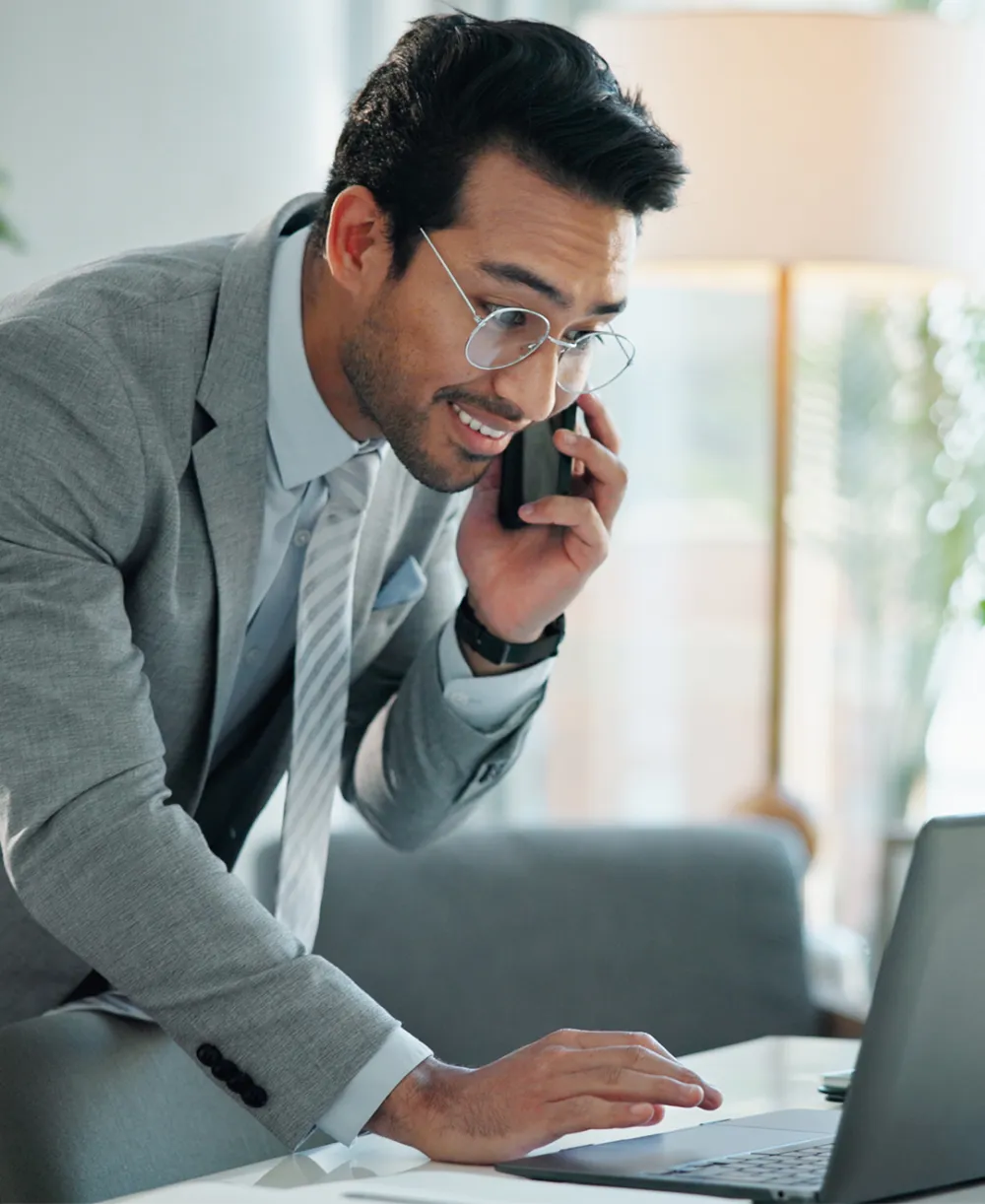 Man in suit and tie on the phone