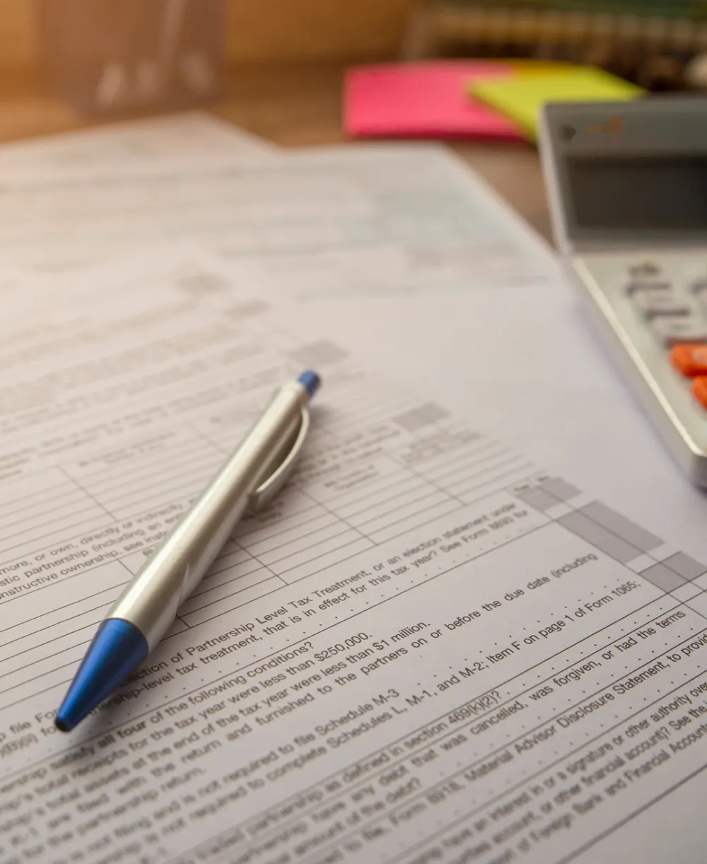 Pen laying on a piece of legal paper