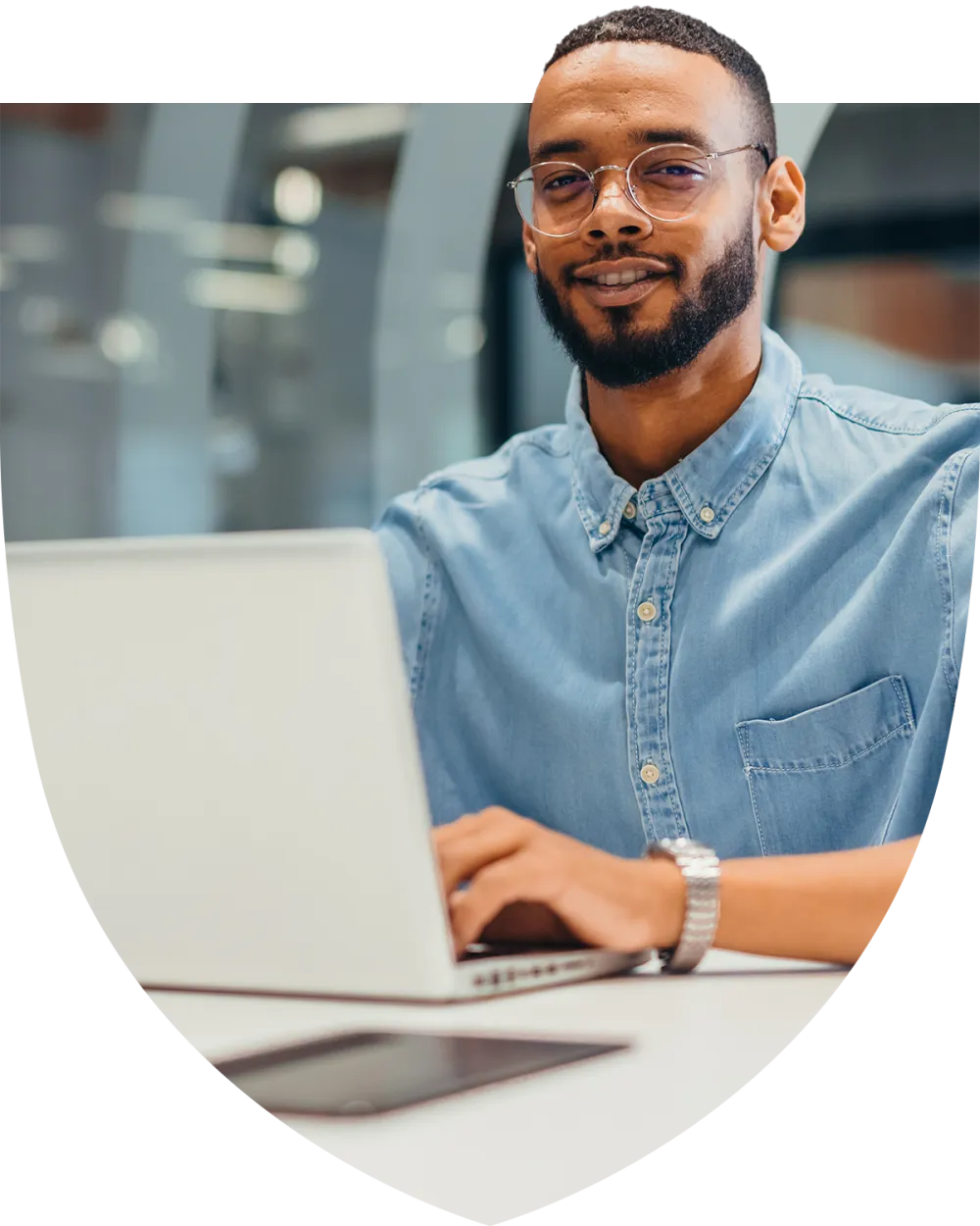 Young male professional studying on his laptop