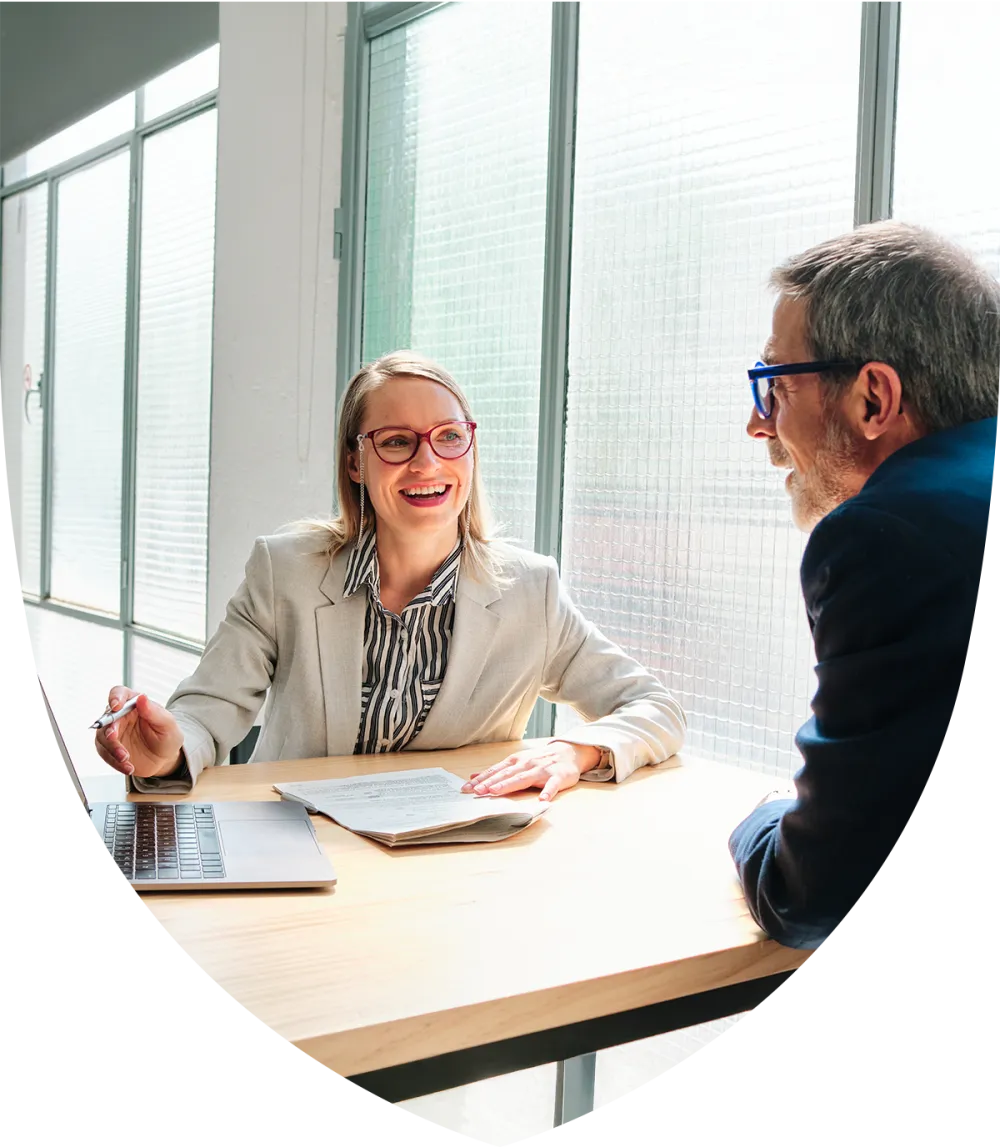 Female advisor speaking with her retirement age client