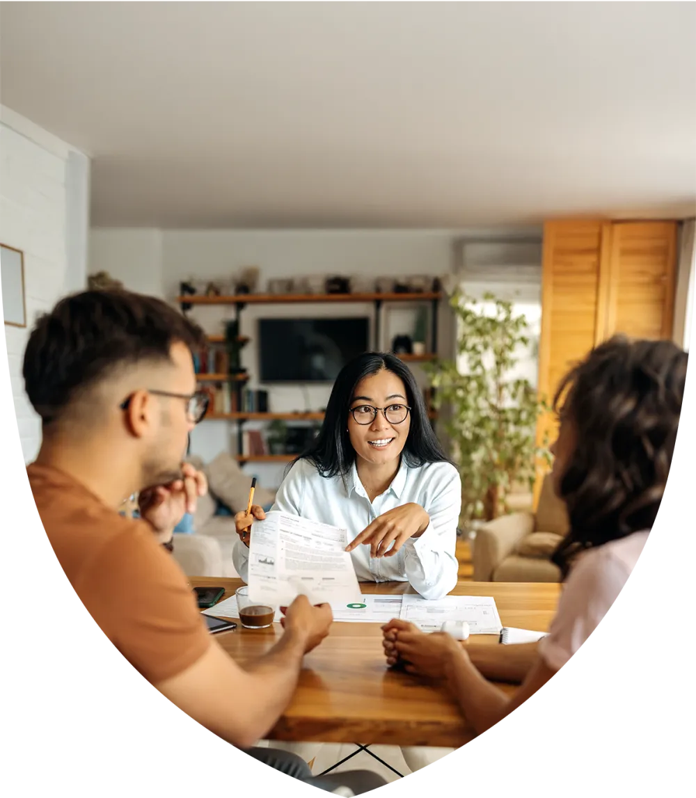 Female advisor meeting with married clients