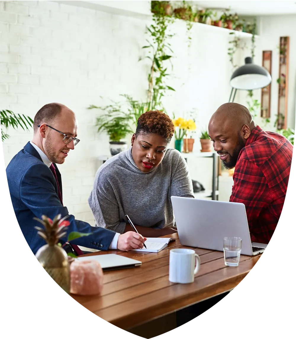 Married couple meeting with their advisor