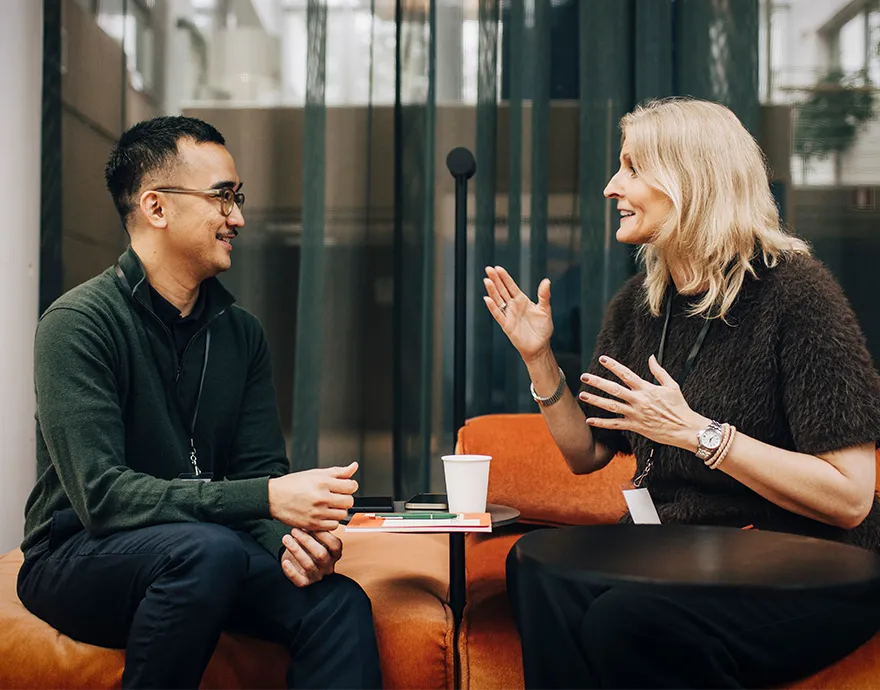 Male and female work colleagues having a meeting 