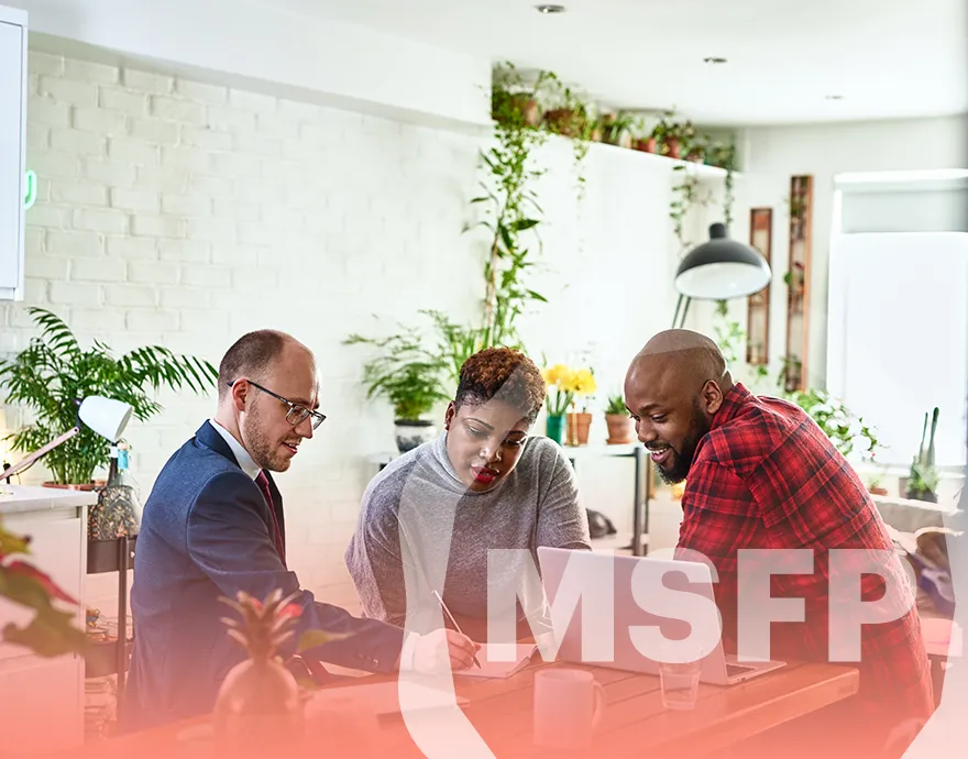 Married couple meeting with their advisor