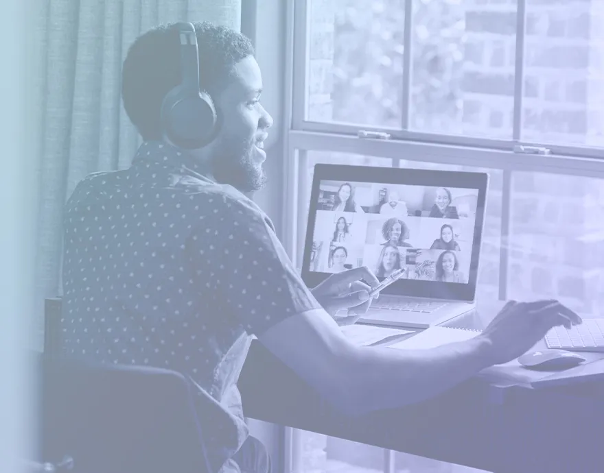 Young professional on a meeting at his computer