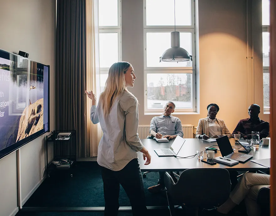 Woman leading a meeting in a conference room