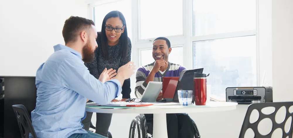 A financial advisor talking to a couple with special needs