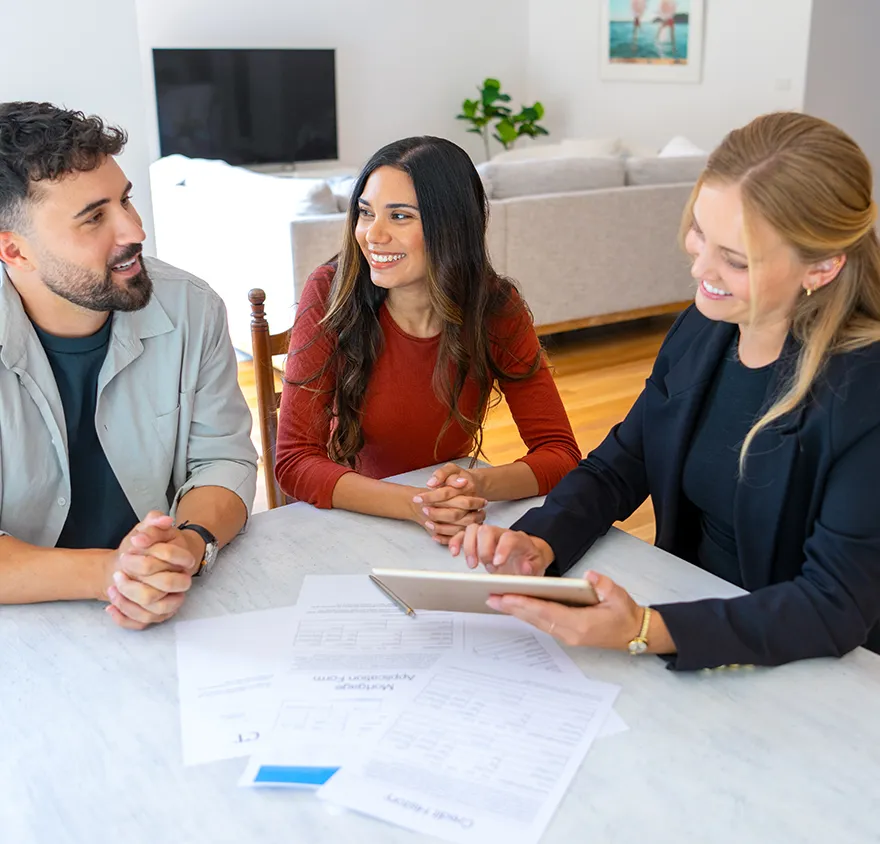 Blonde female advisor meeting with her two clients