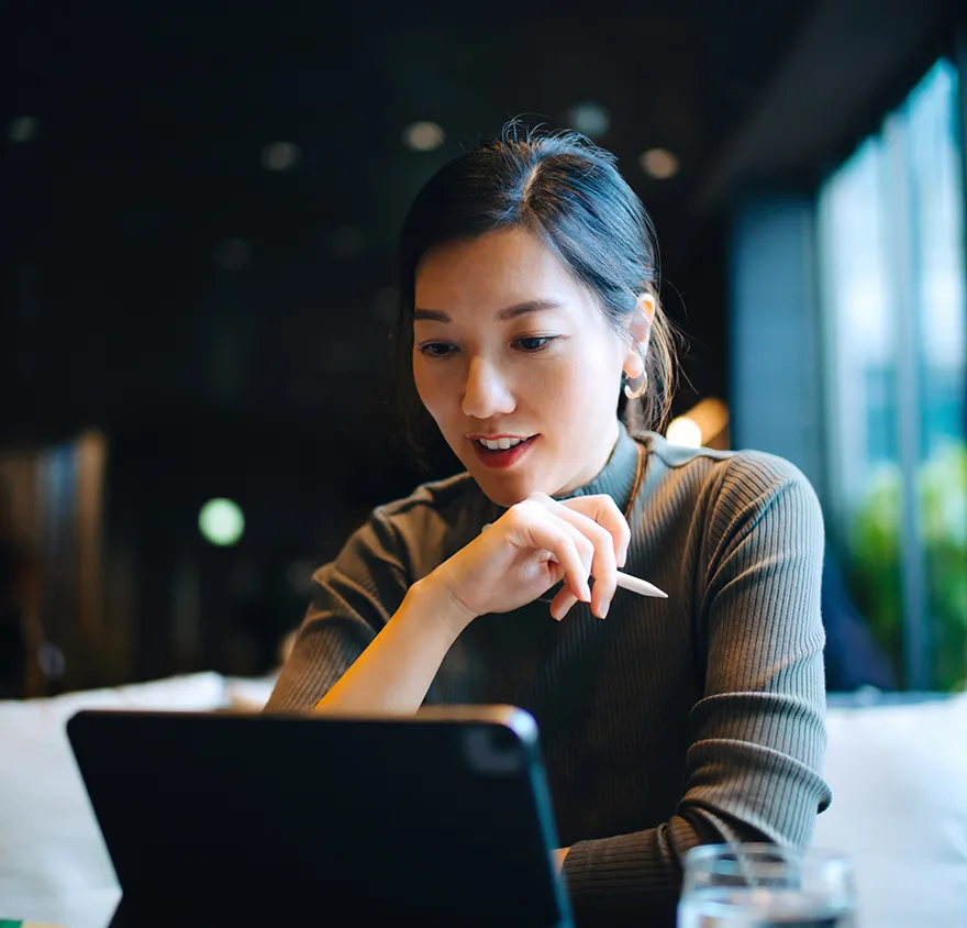 Woman looking at her laptop