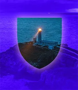 Photo of a lighthouse shining it's light 