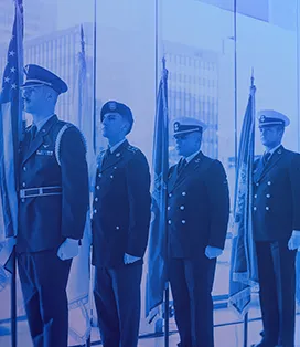 Four military servicemen standing in line