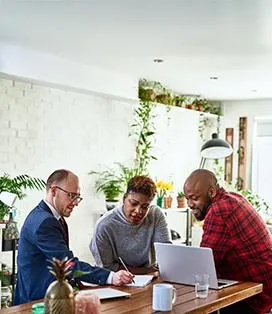 Married couple meeting with their financial advisor