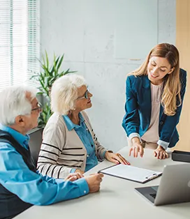Female advisor working with elderly clients