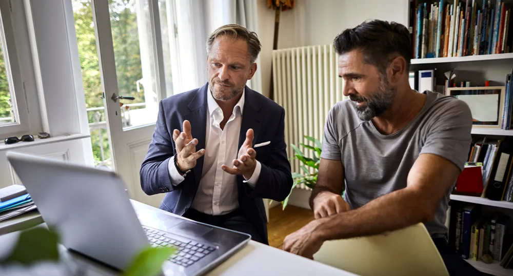 Financial advisor working with his client