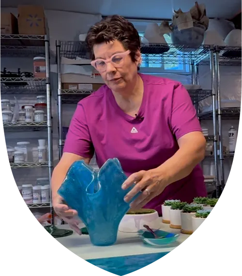 Woman making glass