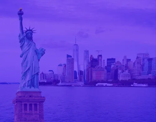Statue of liberty with NYC skyline in the background