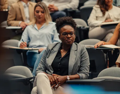 Female student sitting in class for a lecture