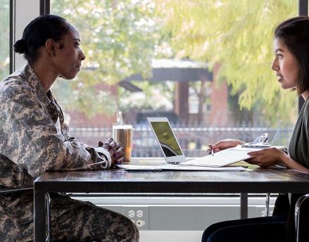 Service woman consulting with an advisor