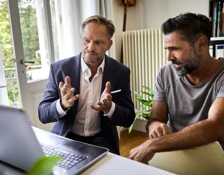 Financial advisor working with his client