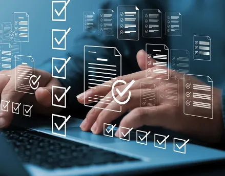 Man typing on his laptop