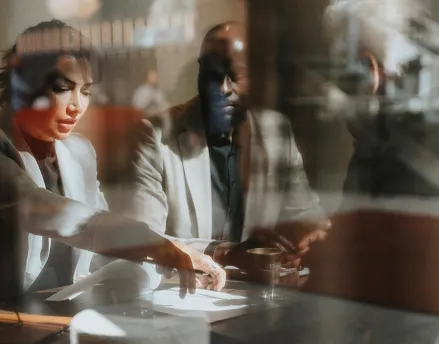Financial advisor speaking with her client