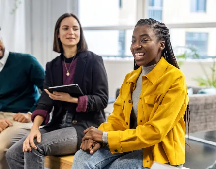 Diverse group of people talking in a group